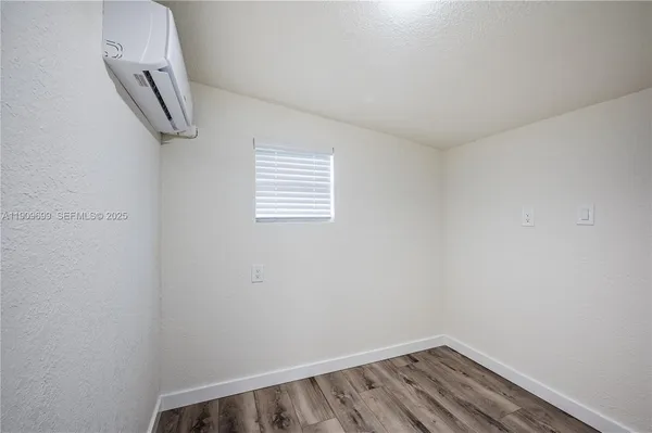 a view of small space with racks on the wall