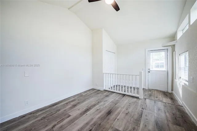 a view of a livingroom with wooden floor
