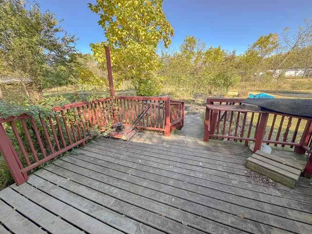 a view of outdoor space with deck