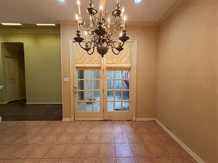 a view of a room that has a beautiful flowers in it