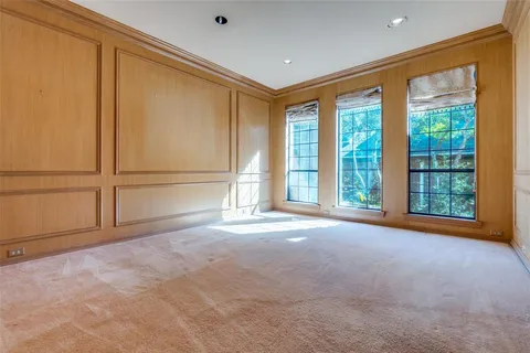 a view of a room with a large window