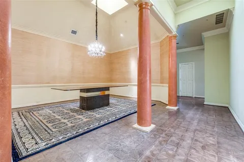 a view of a living room with a rug and a bath tub