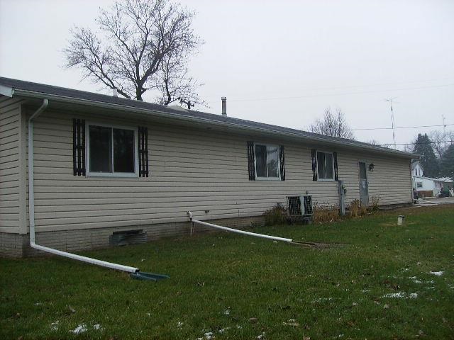 7994 Freeport Road Rockton, IL 61072 - Photo 2 of 3 a backyard of a house with lots of green space