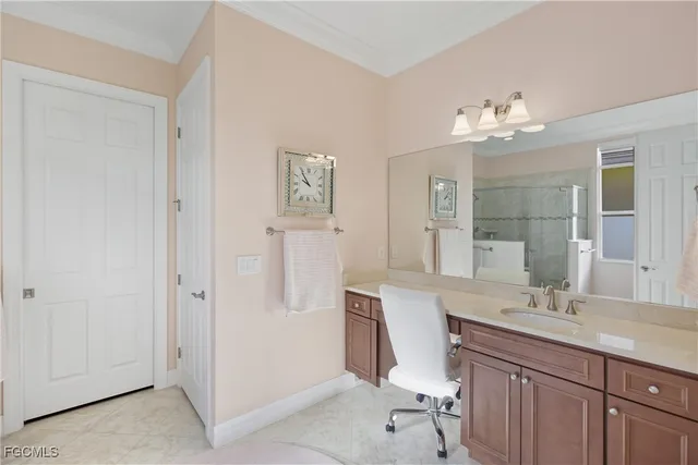 a bathroom with a double vanity sink a mirror and a shower