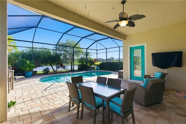 a view of a patio with a table chairs and a table