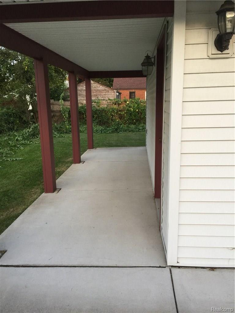 20110 Burt Road Detroit, MI 48219 - Photo 4 of 28 SIDE GARAGE PATIO