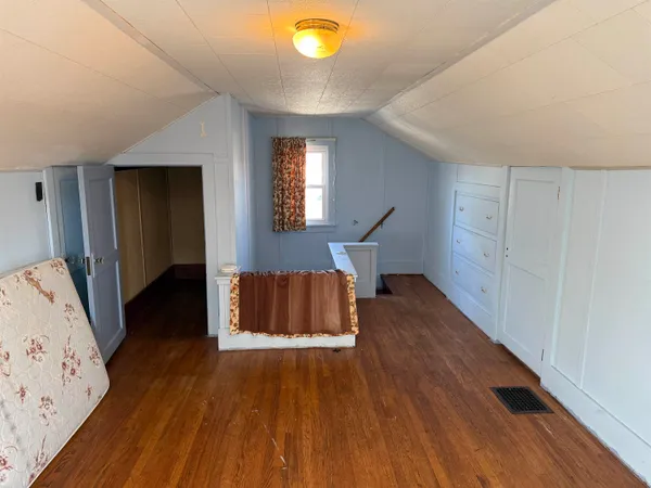 a view of livingroom with furniture and wooden floor
