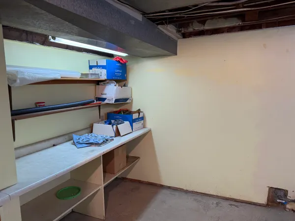 a view of storage and utility room