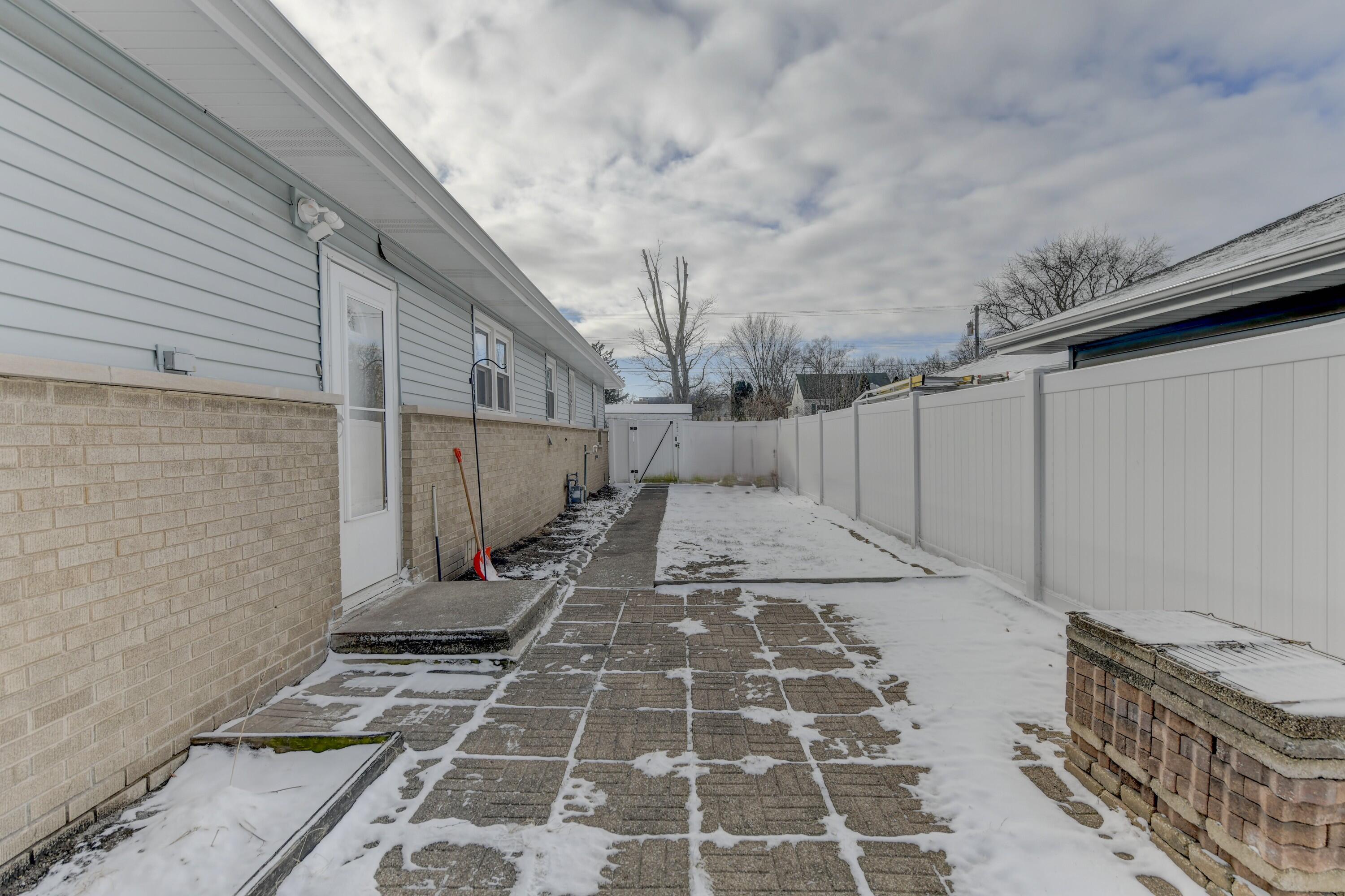 9046 Kleinman Road Highland, IN 46322 - Photo 19 of 20 a view of a backyard with sitting area