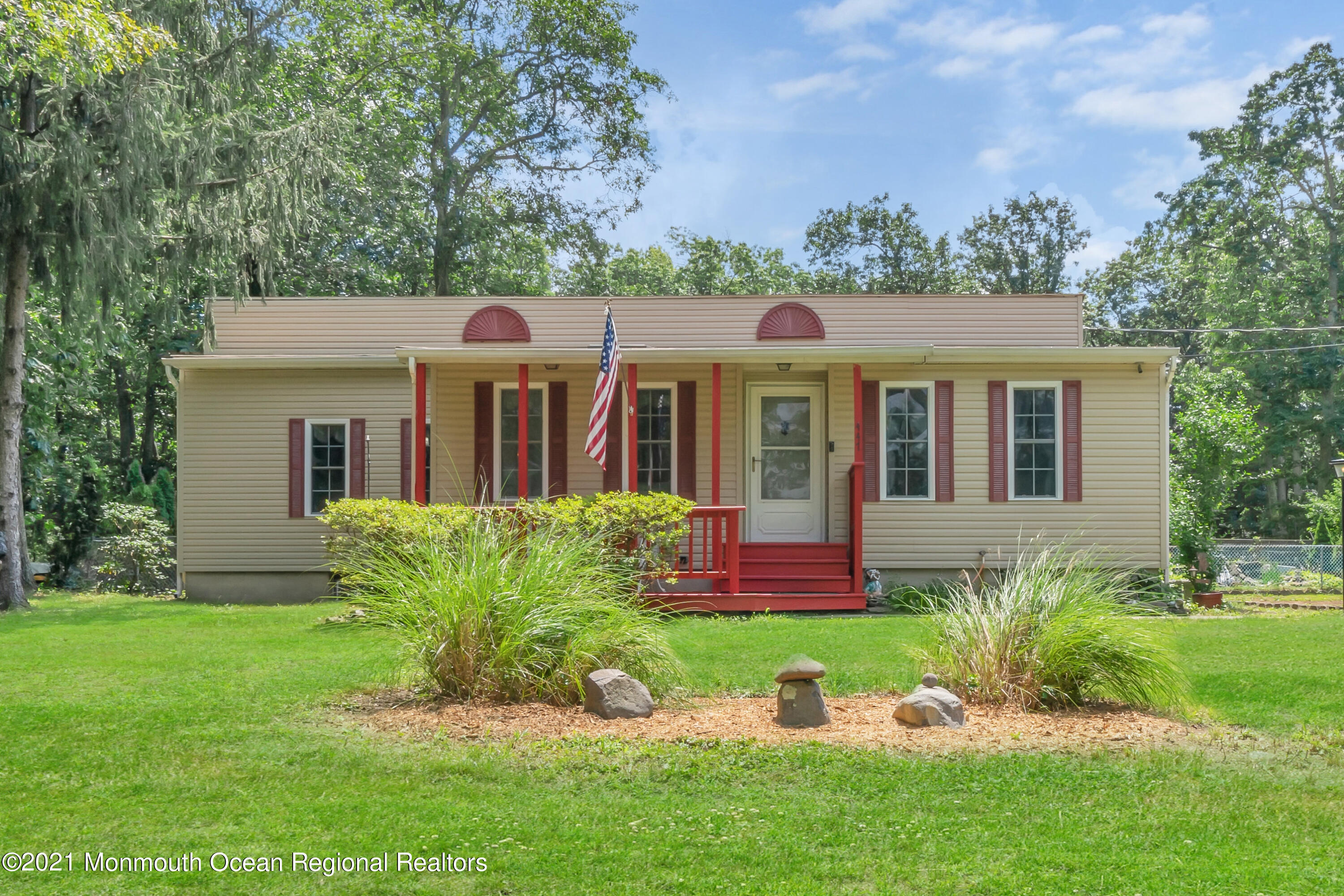 447 Leming Road Jackson, NJ 08527 - Photo 1 of 71 a front view of house with yard and green space
