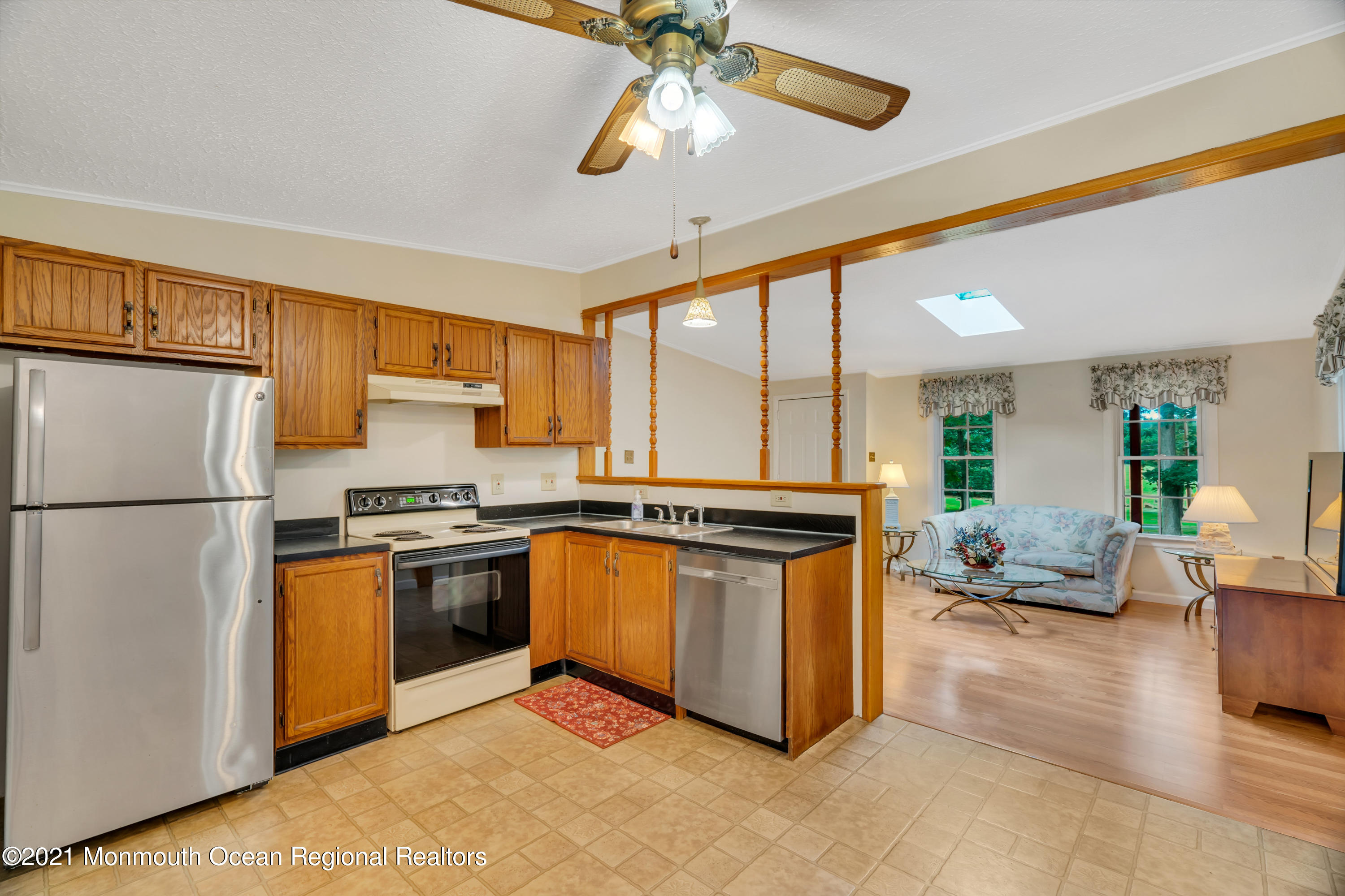 447 Leming Road Jackson, NJ 08527 - Photo 13 of 71 a kitchen with stainless steel appliances granite countertop a stove top oven a refrigerator a sink and dishwasher