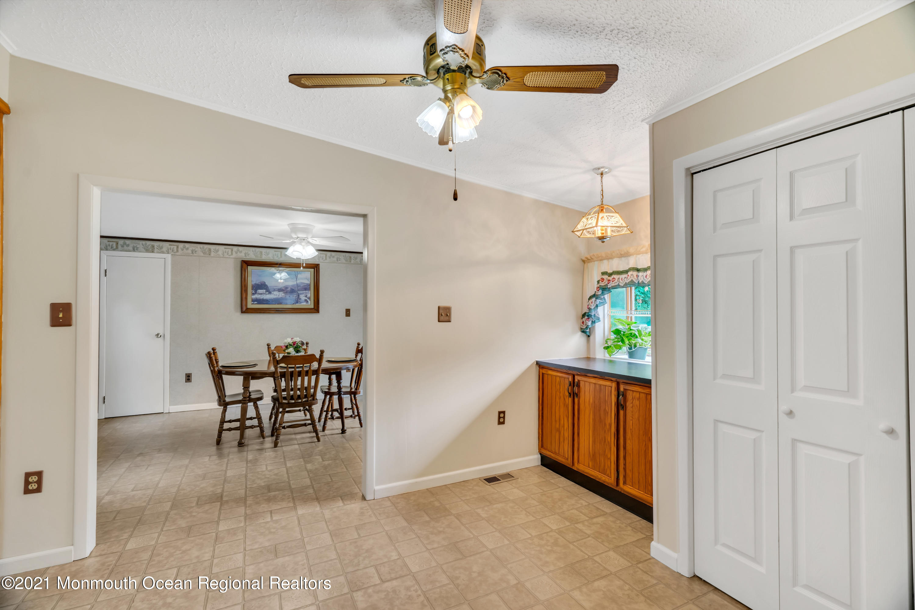 447 Leming Road Jackson, NJ 08527 - Photo 16 of 71 a view of a livingroom with furniture and a ceiling fan