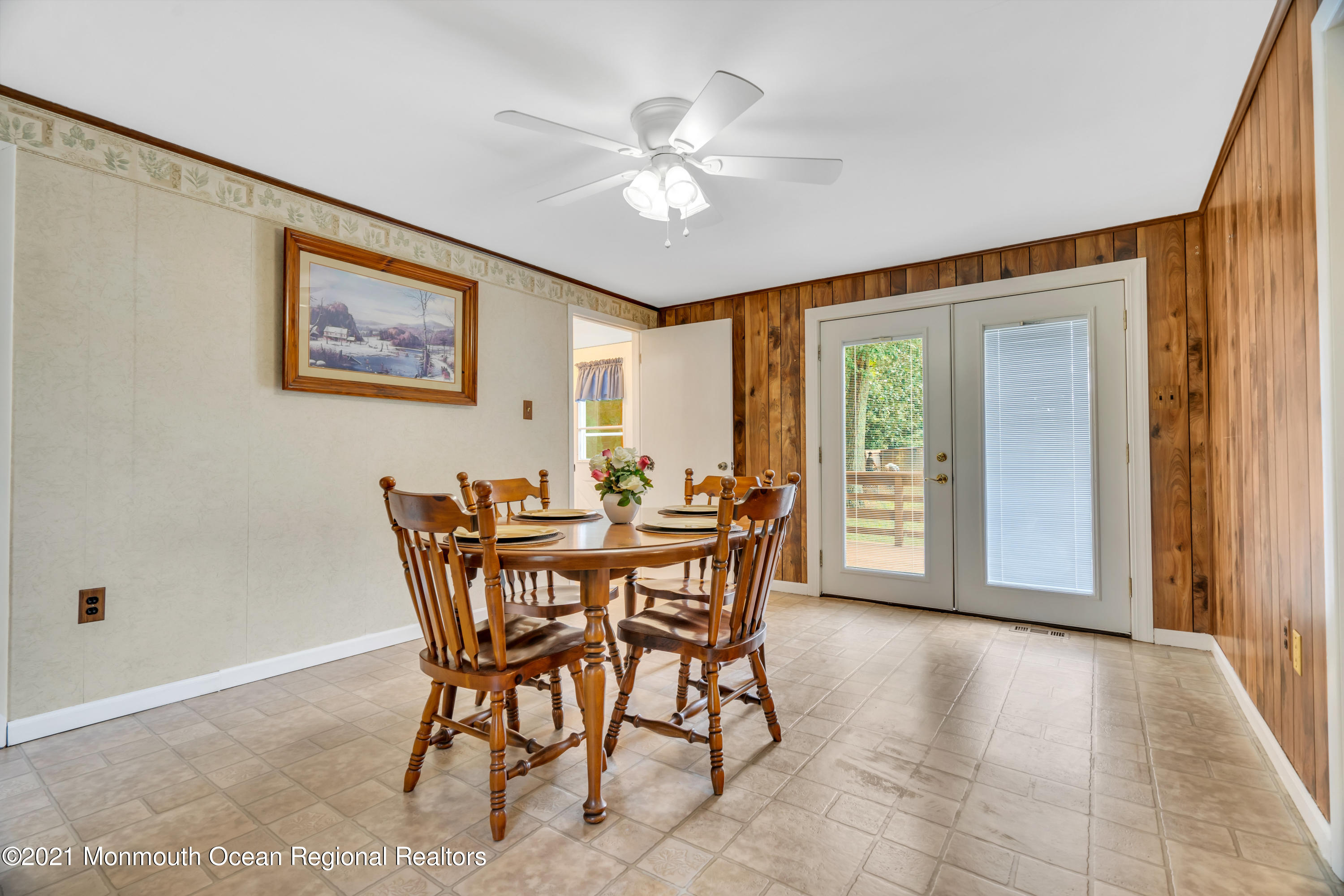 447 Leming Road Jackson, NJ 08527 - Photo 17 of 71 a view of a dining room with furniture and a chandelier