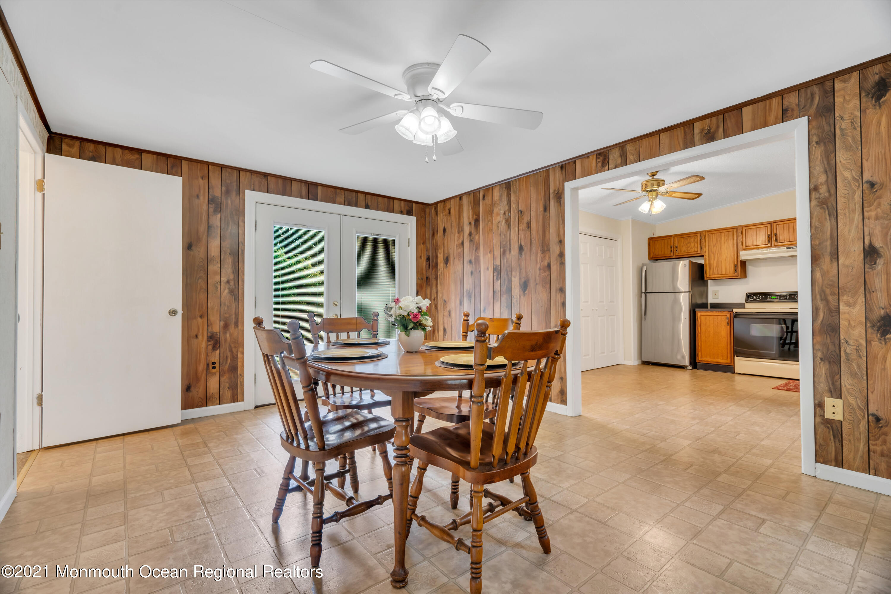 447 Leming Road Jackson, NJ 08527 - Photo 18 of 71 a view of a dining room with furniture and a large window