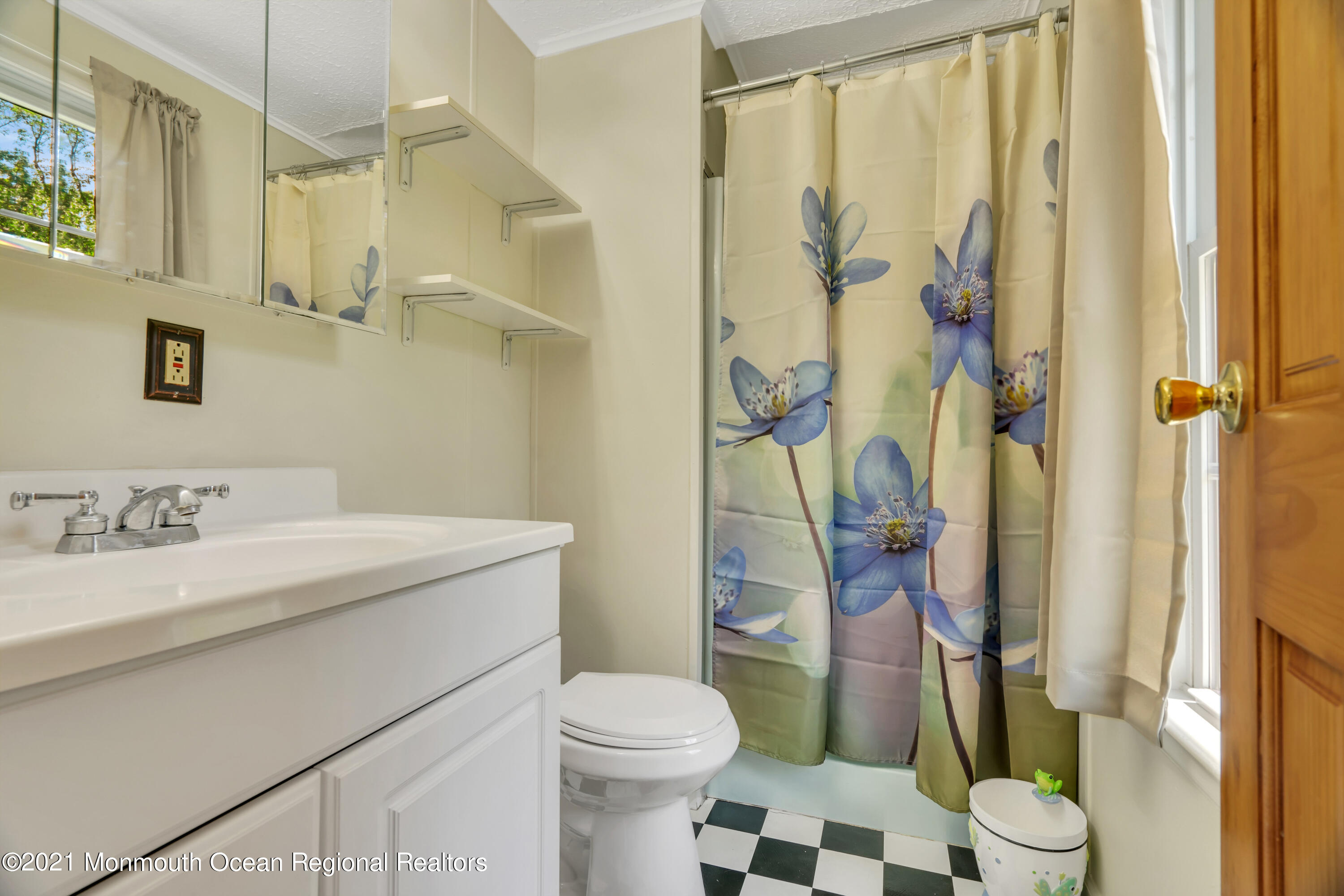 447 Leming Road Jackson, NJ 08527 - Photo 27 of 71 a bathroom with a sink toilet and shower