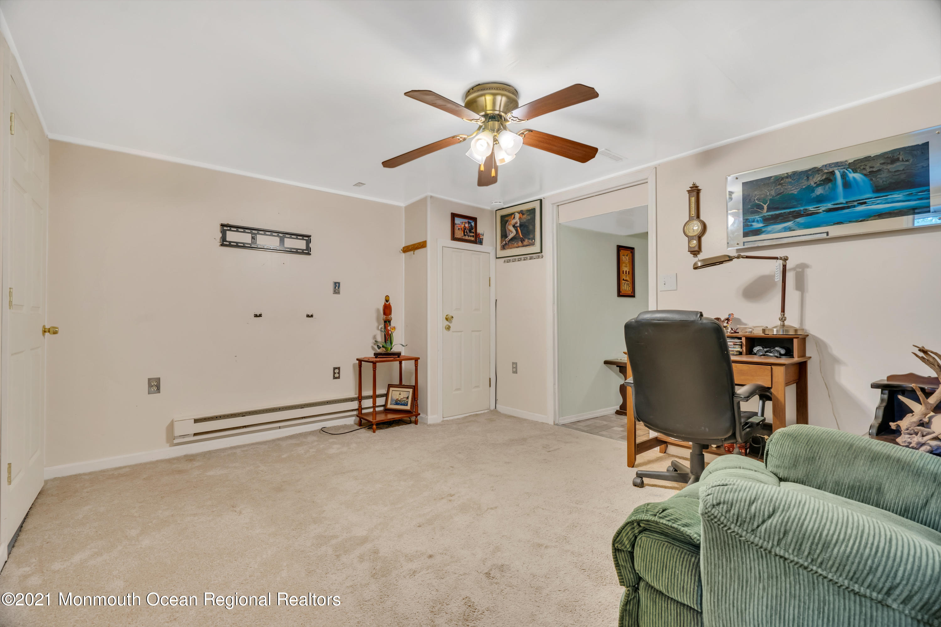 447 Leming Road Jackson, NJ 08527 - Photo 30 of 71 a view of a livingroom with workspace and a couch