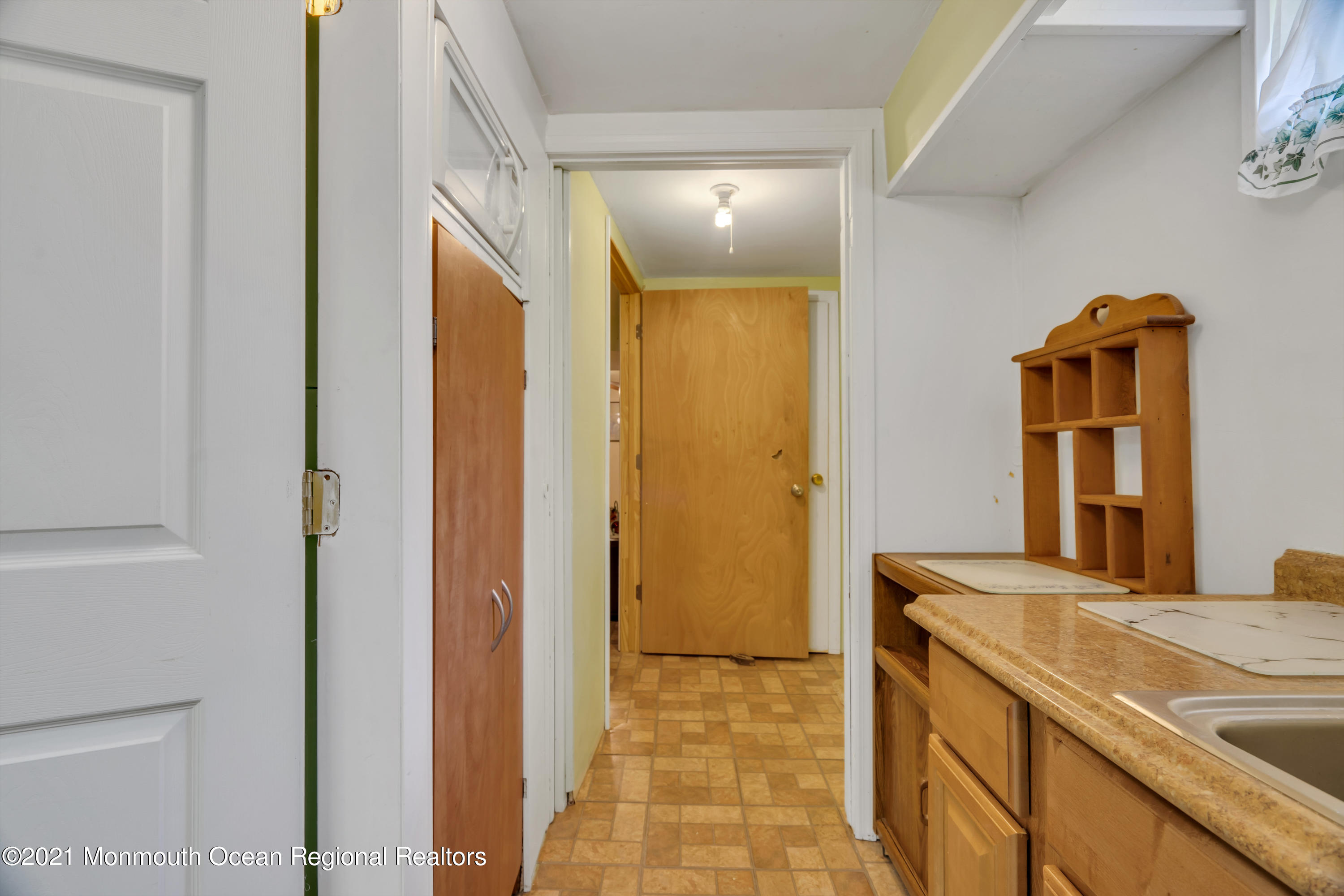 447 Leming Road Jackson, NJ 08527 - Photo 37 of 71 a bathroom with a granite countertop sink and a mirror