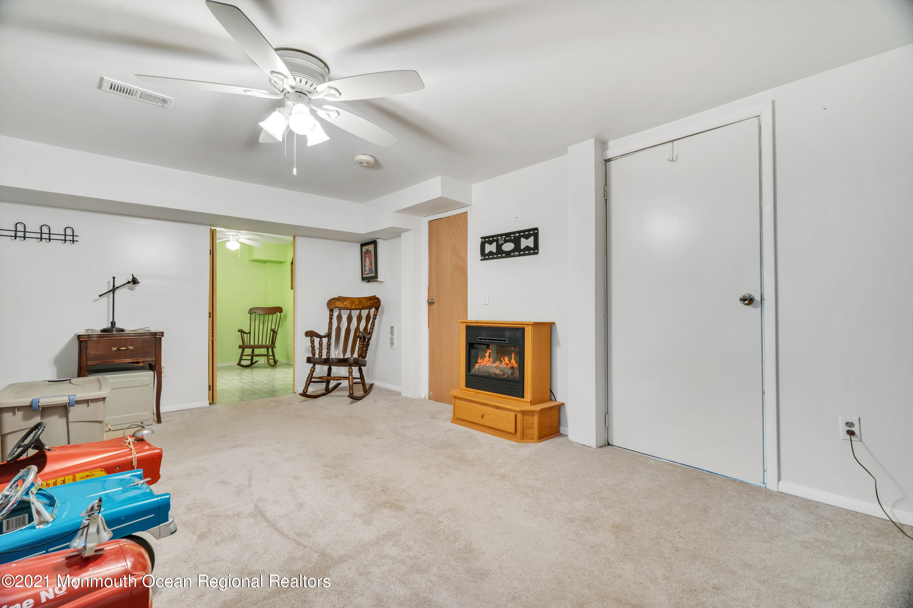 447 Leming Road Jackson, NJ 08527 - Photo 42 of 71 a room with furniture and a flat screen tv