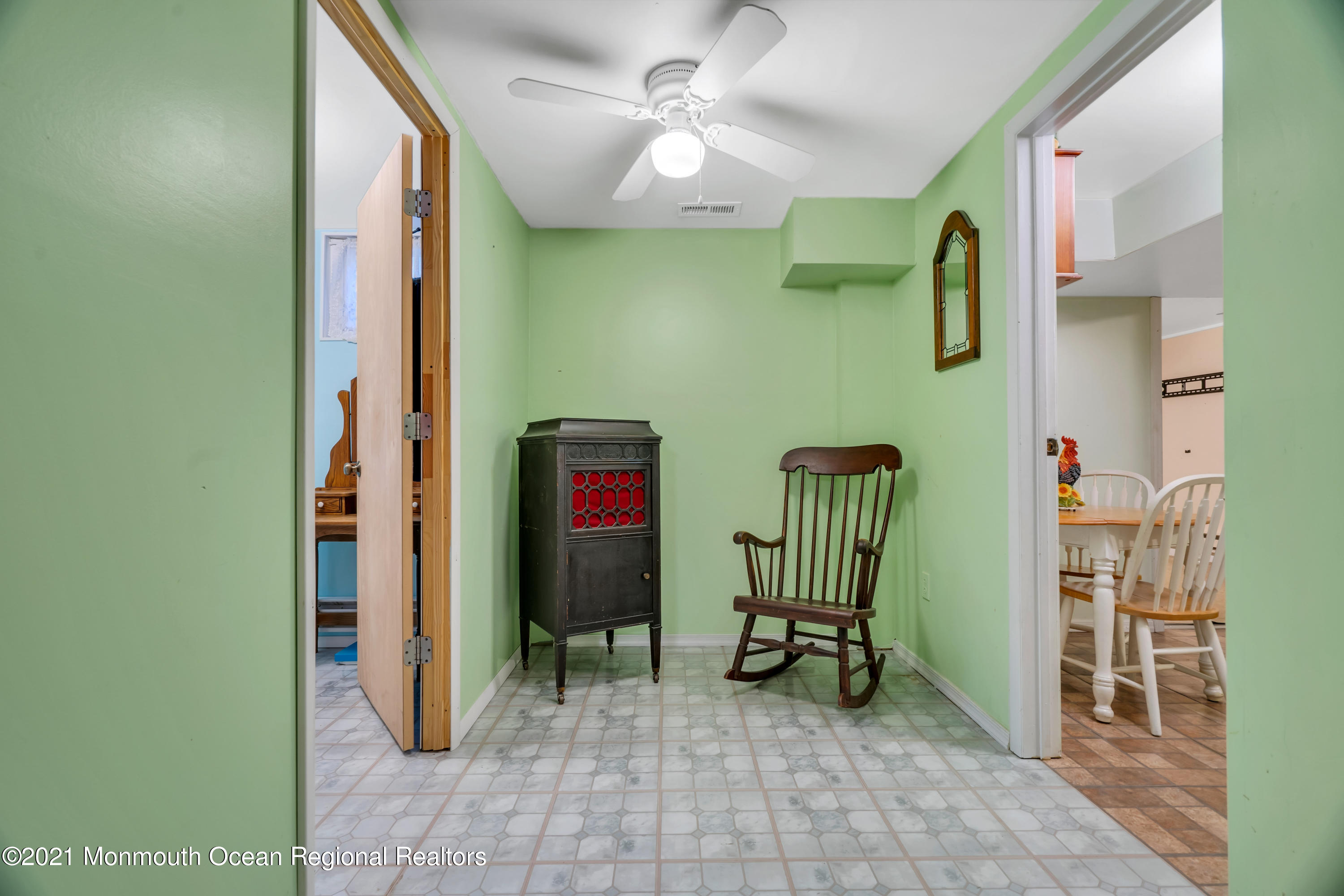 447 Leming Road Jackson, NJ 08527 - Photo 44 of 71 a view of a hallway with workspace and a window
