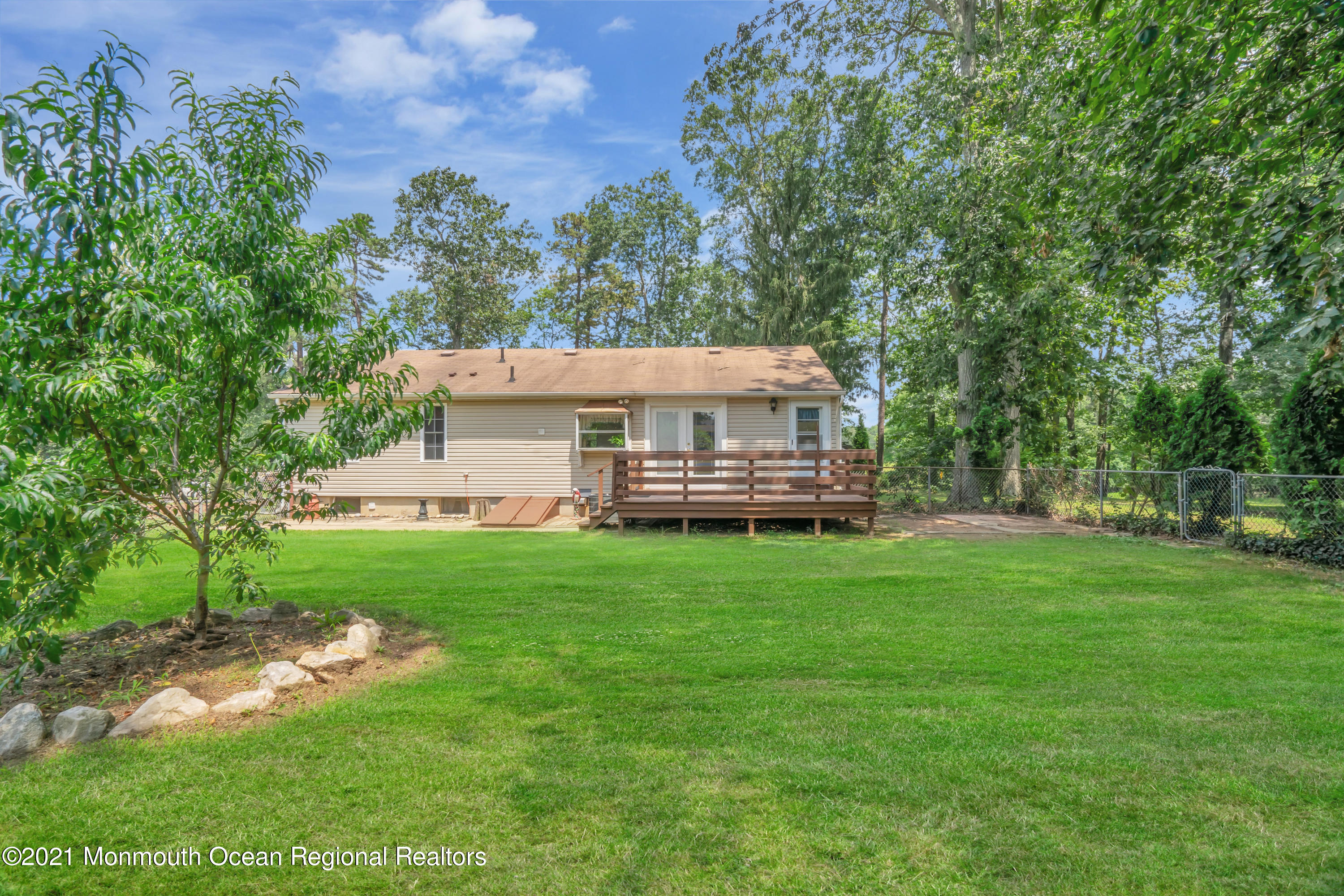 447 Leming Road Jackson, NJ 08527 - Photo 57 of 71 a view of a house with a backyard porch and sitting area