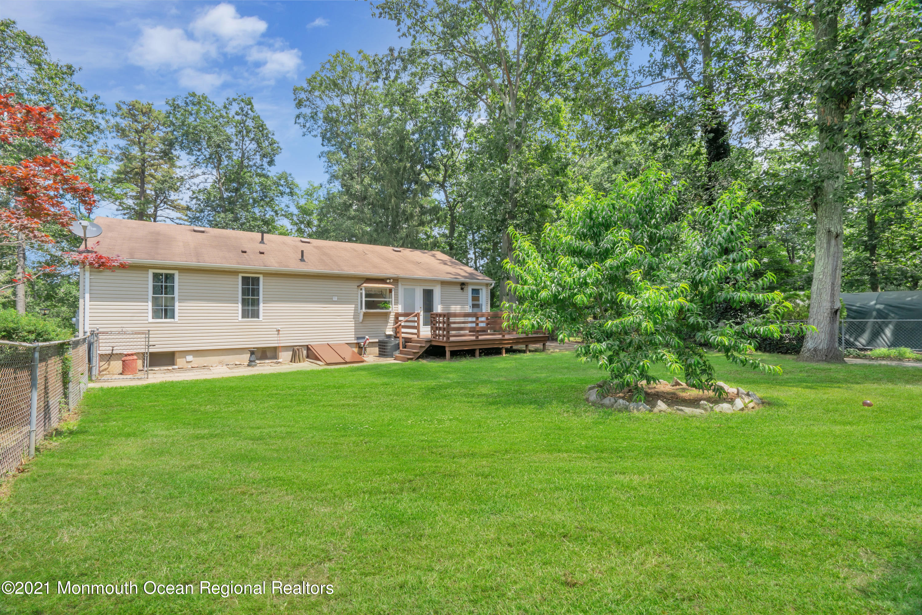 447 Leming Road Jackson, NJ 08527 - Photo 58 of 71 a aerial view of a house with backyard porch and garden