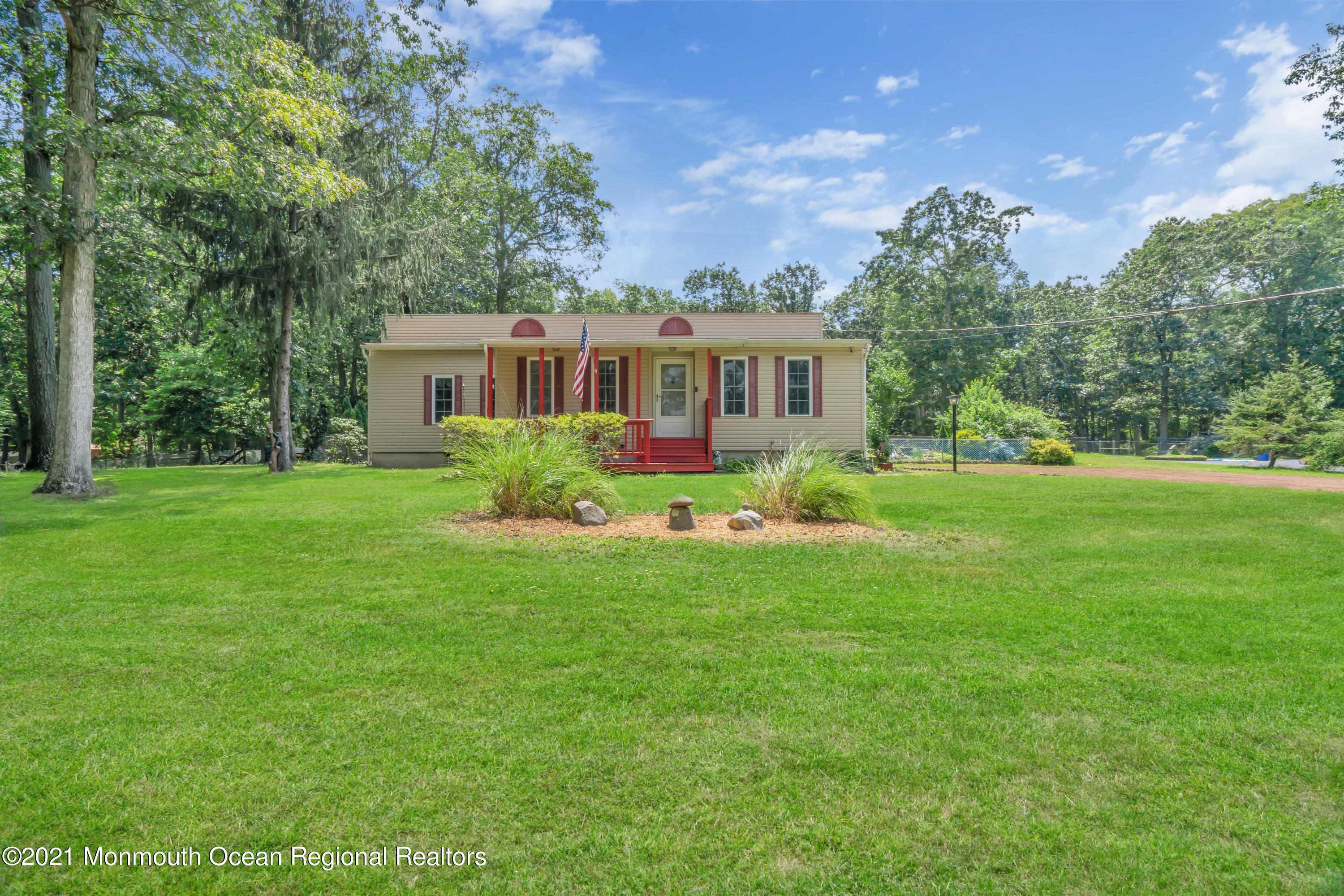 447 Leming Road Jackson, NJ 08527 - Photo 67 of 71 a front view of house with yard and green space
