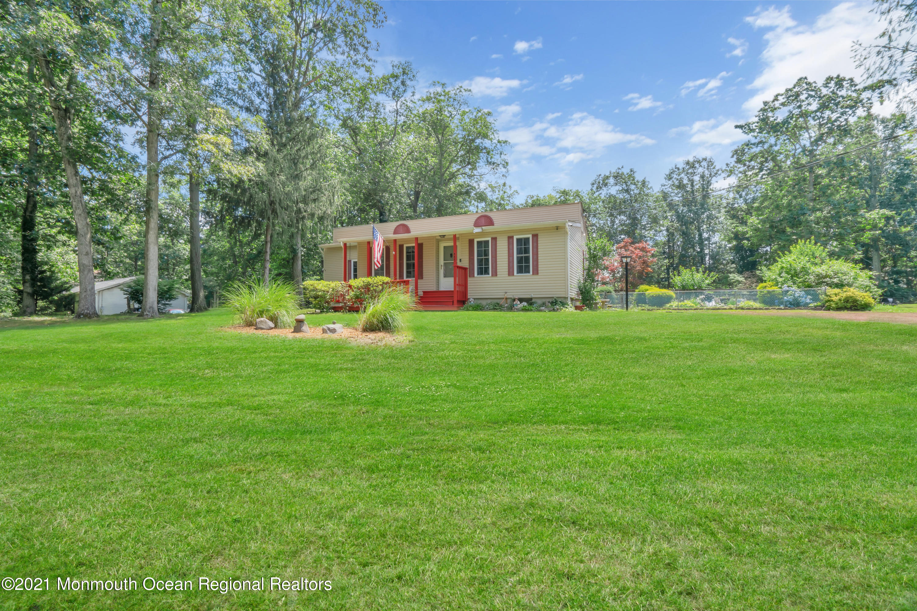 447 Leming Road Jackson, NJ 08527 - Photo 68 of 71 a front view of a house with garden