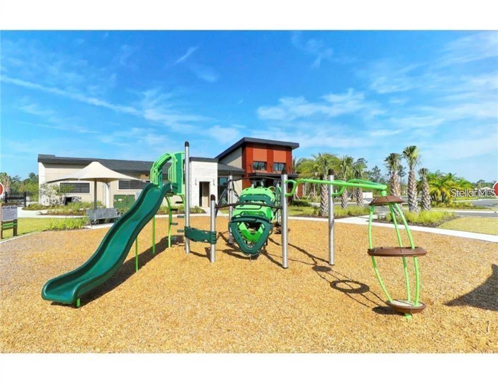 17249 Goldcrest Loop Clermont, FL 34714 - Photo 27 of 29 a swimming pool with outdoor seating