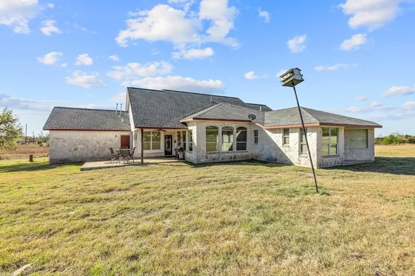 a house view with a garden space