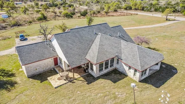 a terrace of a house with outdoor seating