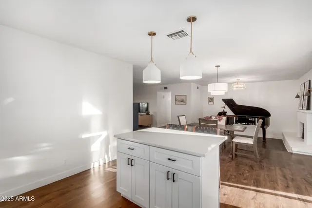 a view of a kitchen and sink