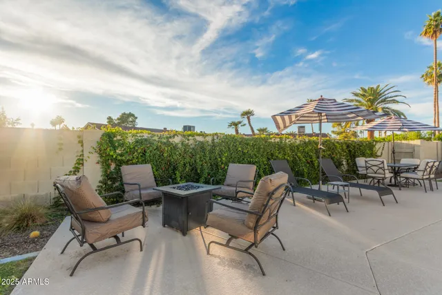 a view of a terrace with furniture