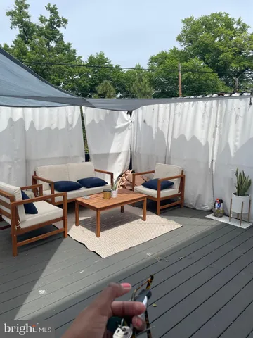 a bedroom with a bed and a sink