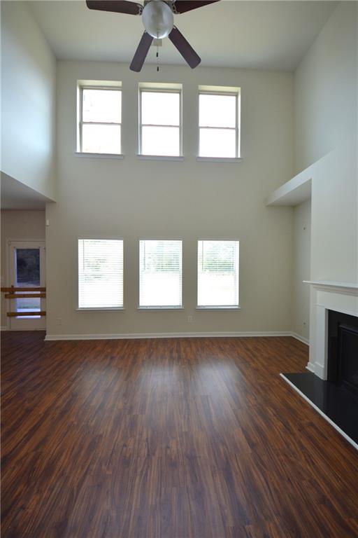 2330 Haliard Way Lithonia, GA 30058 - Photo 13 of 38 a view of an empty room window and wooden floor