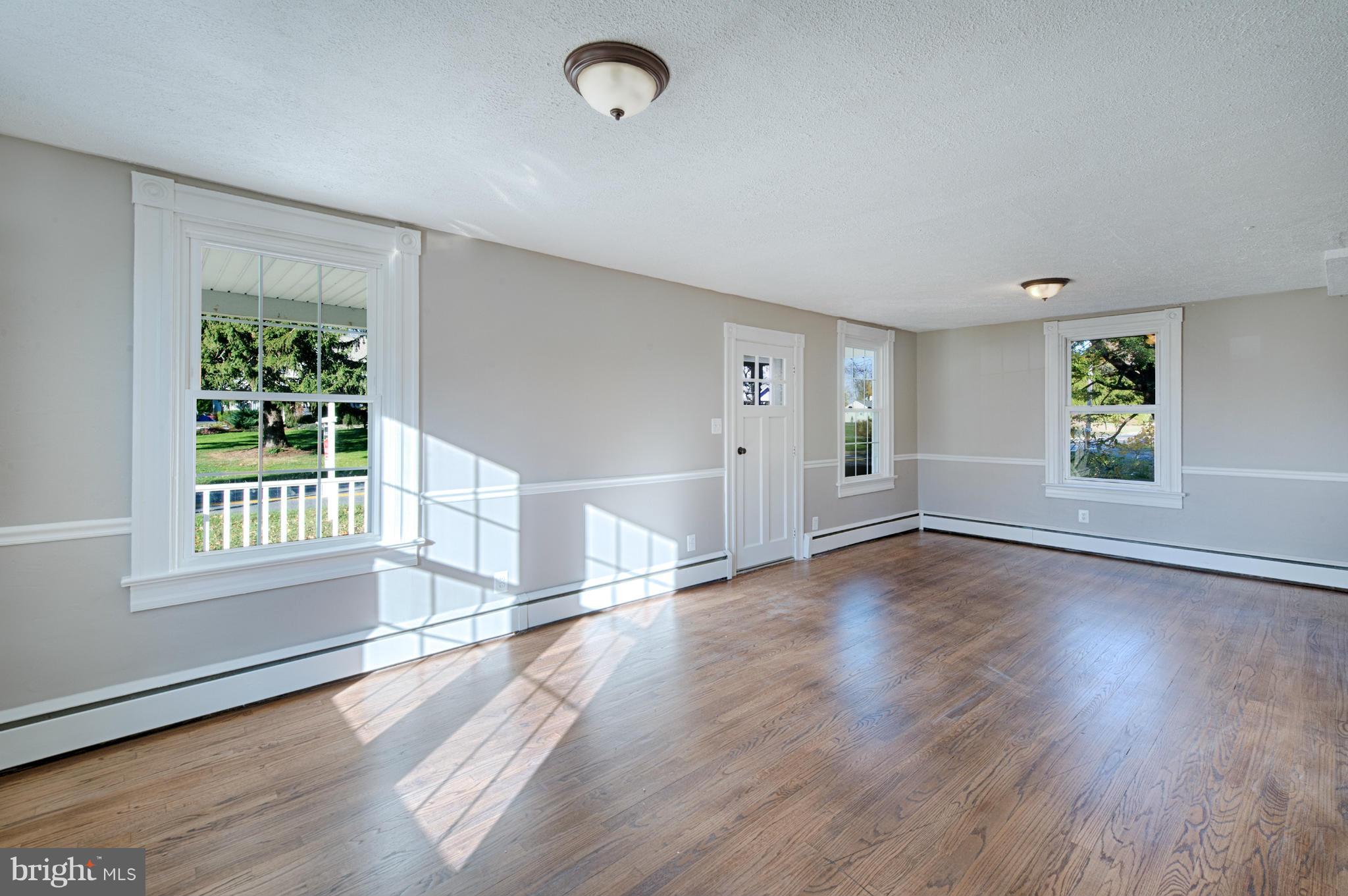 2415 Rocks Road Forest Hill, MD 21050 - Photo 25 of 30 an empty room with wooden floor and windows