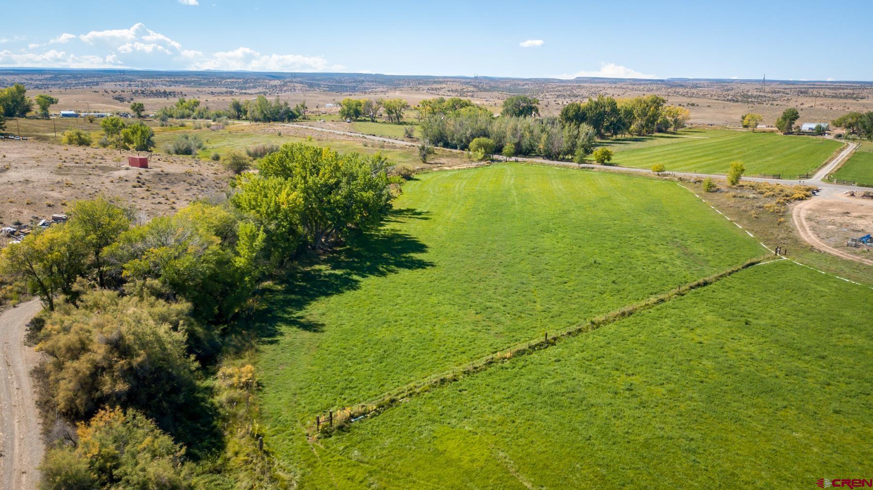 4410 Cedar Road Delta, CO 81416 - Photo 23 of 35 a view of an ocean and a yard