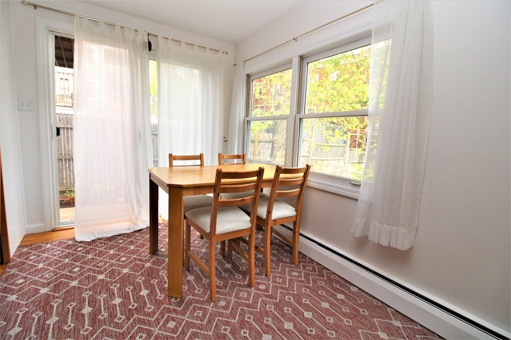 39 Hampstead Road, Unit 1 Boston, MA 02130 - Photo 11 of 29 a dining room with furniture and window