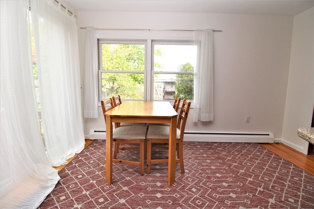39 Hampstead Road, Unit 1 Boston, MA 02130 - Photo 12 of 29 a dining room with furniture and window