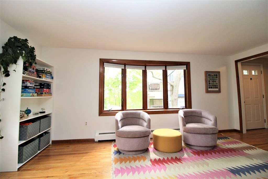 39 Hampstead Road, Unit 1 Boston, MA 02130 - Photo 6 of 29 a living room with furniture and a window