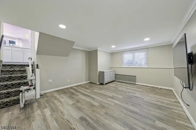 a view of a livingroom with wooden floor