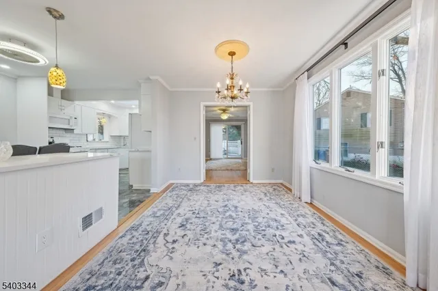 a view of a kitchen and a window