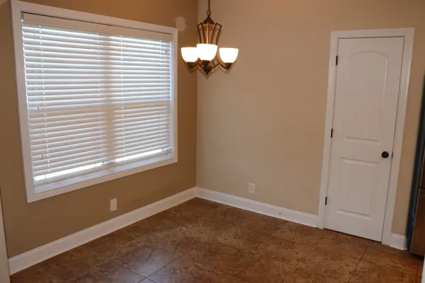 a view of a room that has a window in it