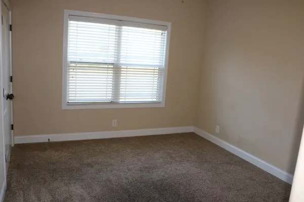 an empty room with a window