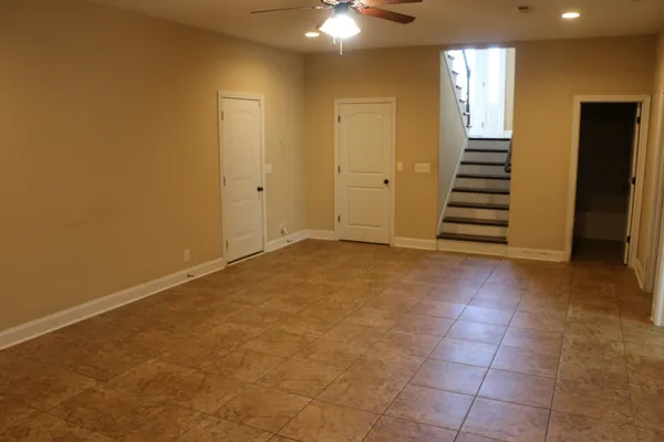 an empty room with a hallway