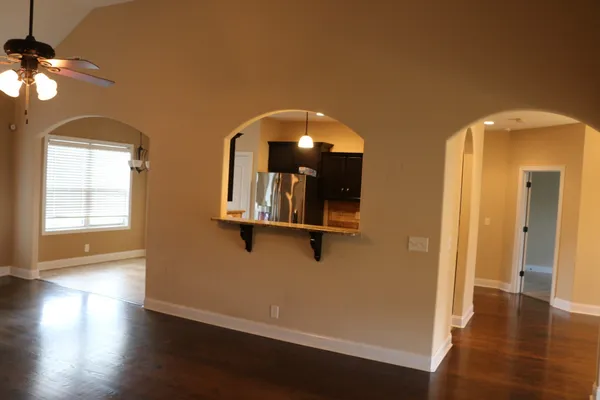 a view of a livingroom with wooden floor