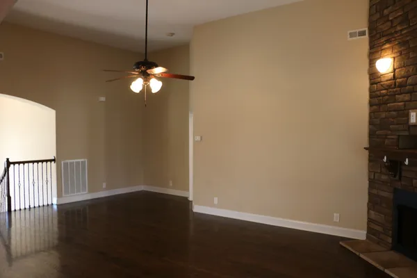 a view of a livingroom with wooden floor