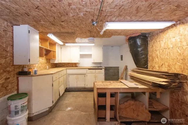 a view of a house with wooden walls