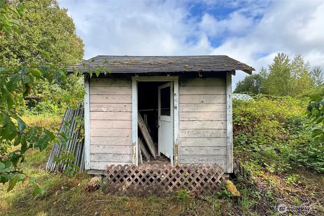 a backyard of a house with lots of green space