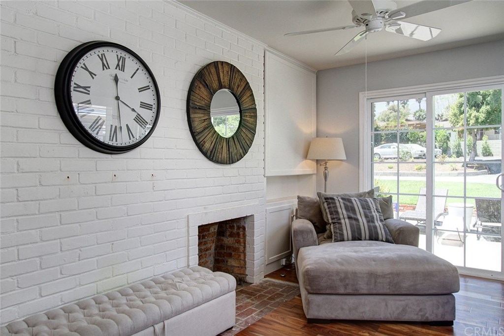 3745 Landfair Road Pasadena, CA 91107 - Photo 12 of 25 a living room with furniture a large window and a fireplace