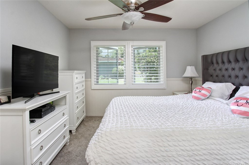 3745 Landfair Road Pasadena, CA 91107 - Photo 16 of 25 a bedroom with a bed and a flat screen tv